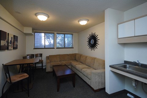 a living room with a couch and a table